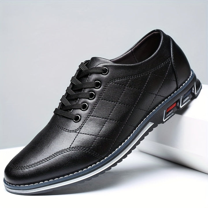 Baskets matelassées homme à lacets – détail sportif au talon