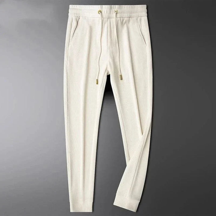 Pantalon homme Cavo en coton – texture côtelée et détail doré