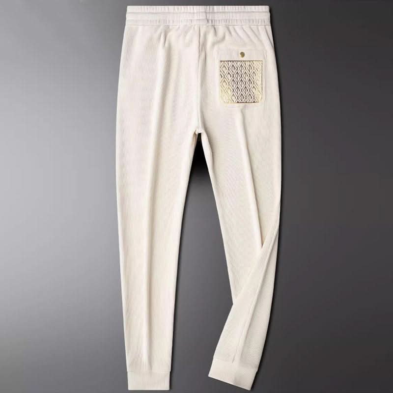 Pantalon homme Cavo en coton – texture côtelée et détail doré