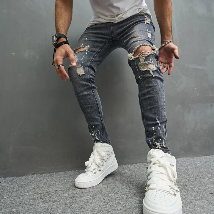 Jean slim homme en denim stretch – détails déchirés tendance